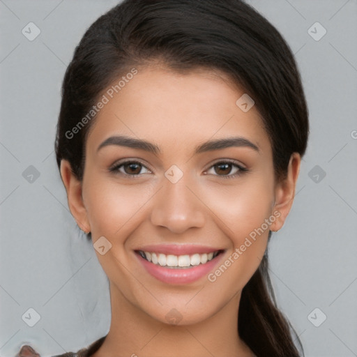 Joyful white young-adult female with long  brown hair and brown eyes