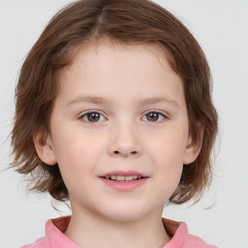 Joyful white child female with medium  brown hair and brown eyes