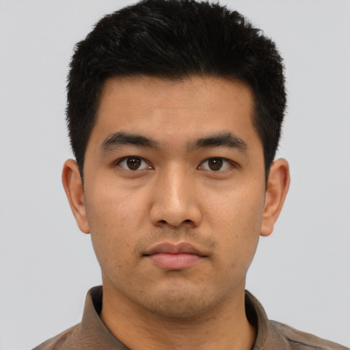 Neutral asian young-adult male with short  black hair and brown eyes