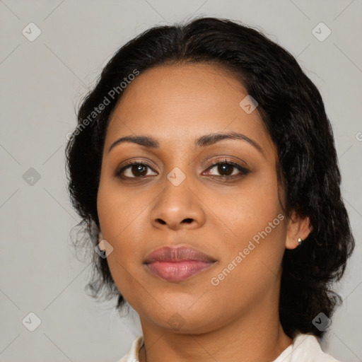 Joyful latino young-adult female with medium  black hair and brown eyes