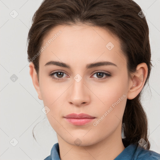 Neutral white young-adult female with medium  brown hair and brown eyes