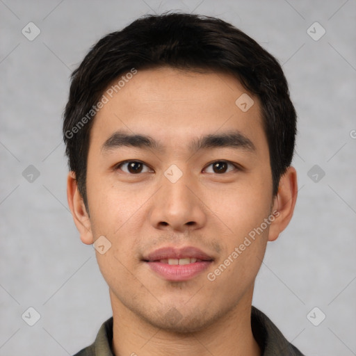 Joyful white young-adult male with short  black hair and brown eyes