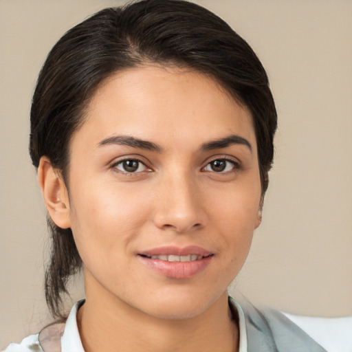 Joyful white young-adult female with medium  brown hair and brown eyes