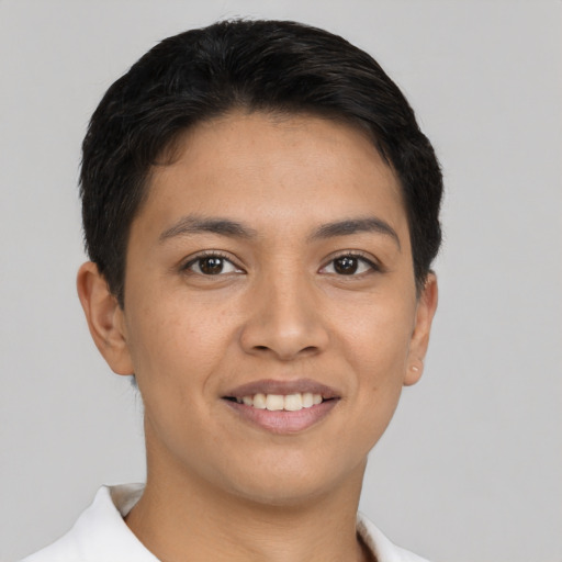 Joyful asian young-adult female with short  brown hair and brown eyes