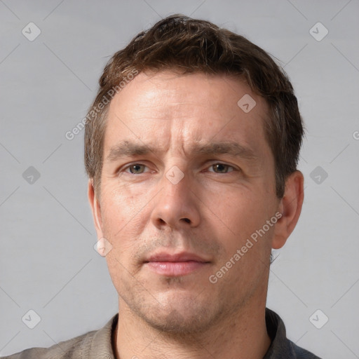 Neutral white adult male with short  brown hair and brown eyes