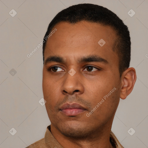 Neutral latino young-adult male with short  black hair and brown eyes