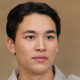 Neutral latino young-adult male with short  brown hair and brown eyes