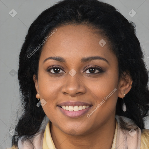 Joyful black young-adult female with long  black hair and brown eyes