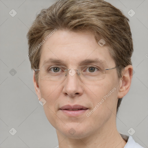 Joyful white adult female with short  brown hair and grey eyes