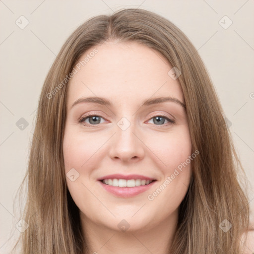 Joyful white young-adult female with long  brown hair and green eyes