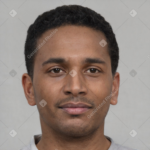 Neutral latino young-adult male with short  black hair and brown eyes