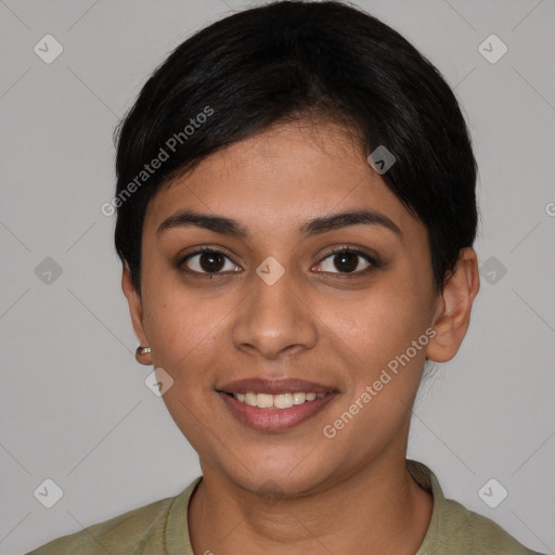 Joyful latino young-adult female with short  black hair and brown eyes