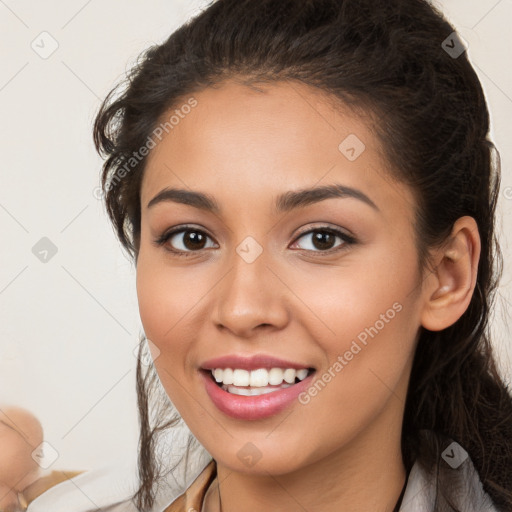 Joyful white young-adult female with long  brown hair and brown eyes