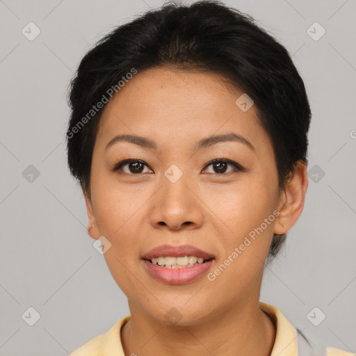 Joyful asian young-adult female with short  brown hair and brown eyes