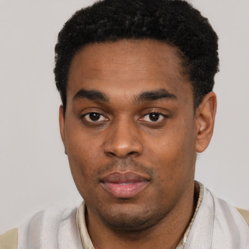 Neutral black young-adult male with short  black hair and brown eyes