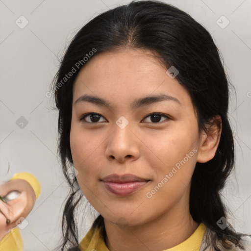 Joyful asian young-adult female with medium  brown hair and brown eyes