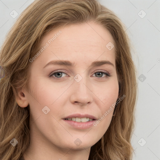 Joyful white young-adult female with long  brown hair and blue eyes