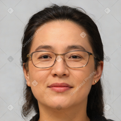 Joyful white adult female with medium  brown hair and brown eyes