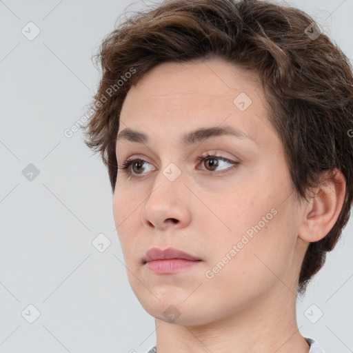 Neutral white young-adult female with short  brown hair and brown eyes