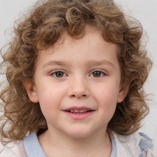 Joyful white child female with medium  brown hair and grey eyes