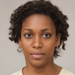 Neutral black young-adult female with short  brown hair and brown eyes