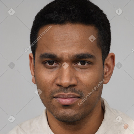 Neutral latino young-adult male with short  black hair and brown eyes