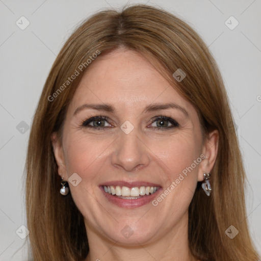 Joyful white adult female with medium  brown hair and grey eyes