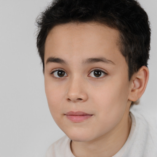 Joyful white child female with short  brown hair and brown eyes