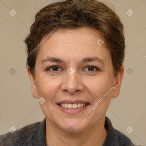 Joyful white adult female with short  brown hair and brown eyes