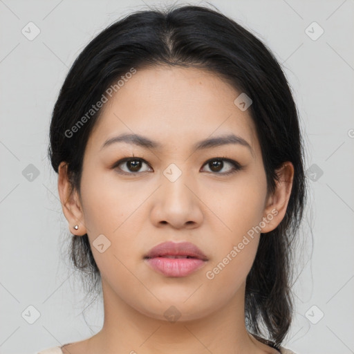 Joyful asian young-adult female with medium  black hair and brown eyes