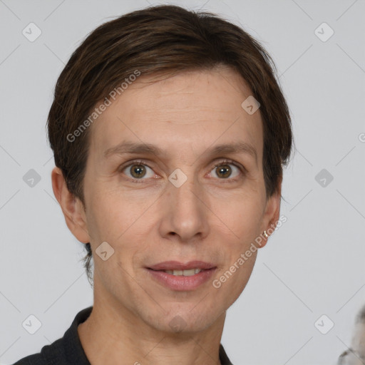 Joyful white adult female with short  brown hair and grey eyes