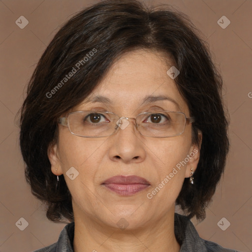 Joyful white adult female with medium  brown hair and brown eyes