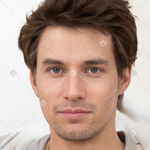 Neutral white young-adult male with short  brown hair and brown eyes