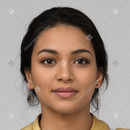 Joyful latino young-adult female with medium  black hair and brown eyes