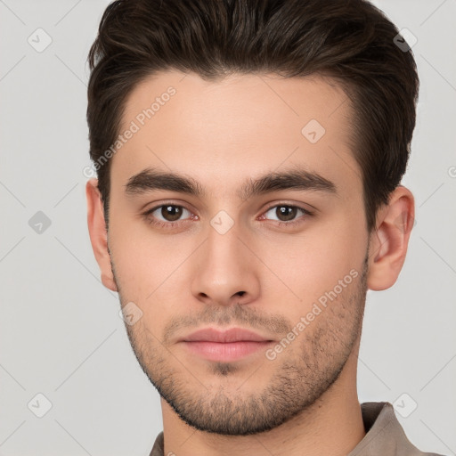 Neutral white young-adult male with short  brown hair and brown eyes