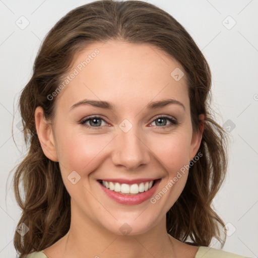 Joyful white young-adult female with medium  brown hair and green eyes