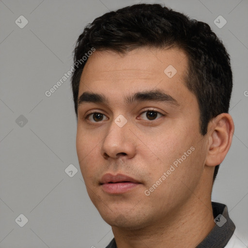 Neutral white young-adult male with short  black hair and brown eyes