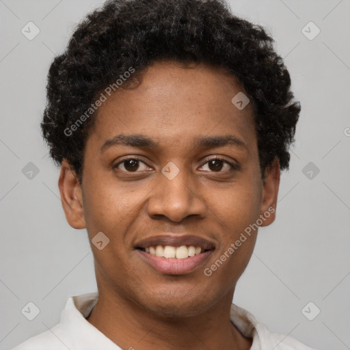 Joyful black young-adult male with short  brown hair and brown eyes