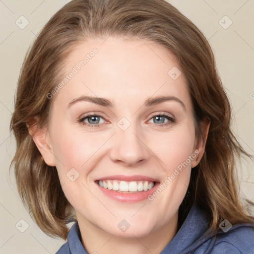 Joyful white young-adult female with medium  brown hair and blue eyes