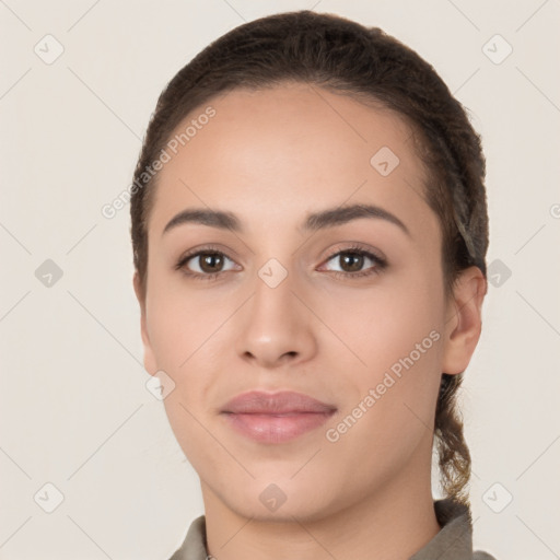 Neutral white young-adult female with short  brown hair and brown eyes