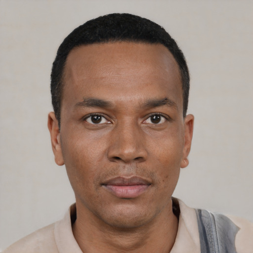 Neutral black young-adult male with short  black hair and brown eyes