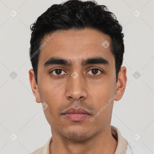 Neutral latino young-adult male with short  black hair and brown eyes
