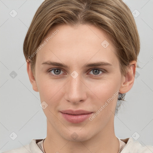 Joyful white young-adult female with short  brown hair and grey eyes