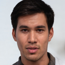 Neutral white young-adult male with short  black hair and brown eyes
