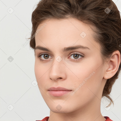 Neutral white young-adult female with medium  brown hair and grey eyes