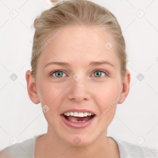 Joyful white young-adult female with short  brown hair and blue eyes