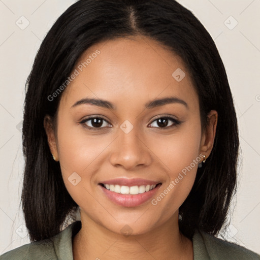 Joyful latino young-adult female with long  brown hair and brown eyes