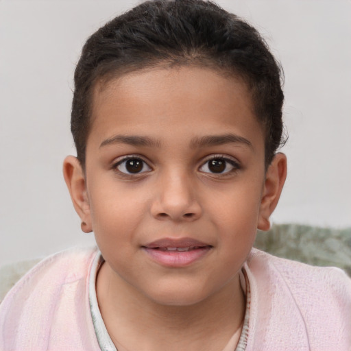 Joyful white child female with short  brown hair and brown eyes