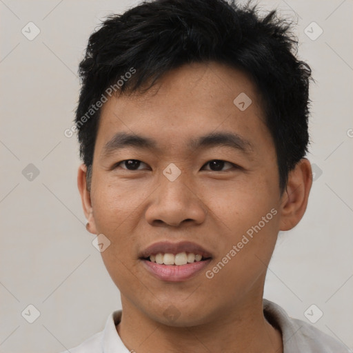 Joyful asian young-adult male with short  black hair and brown eyes