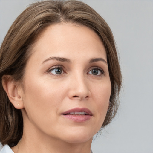 Neutral white young-adult female with medium  brown hair and brown eyes